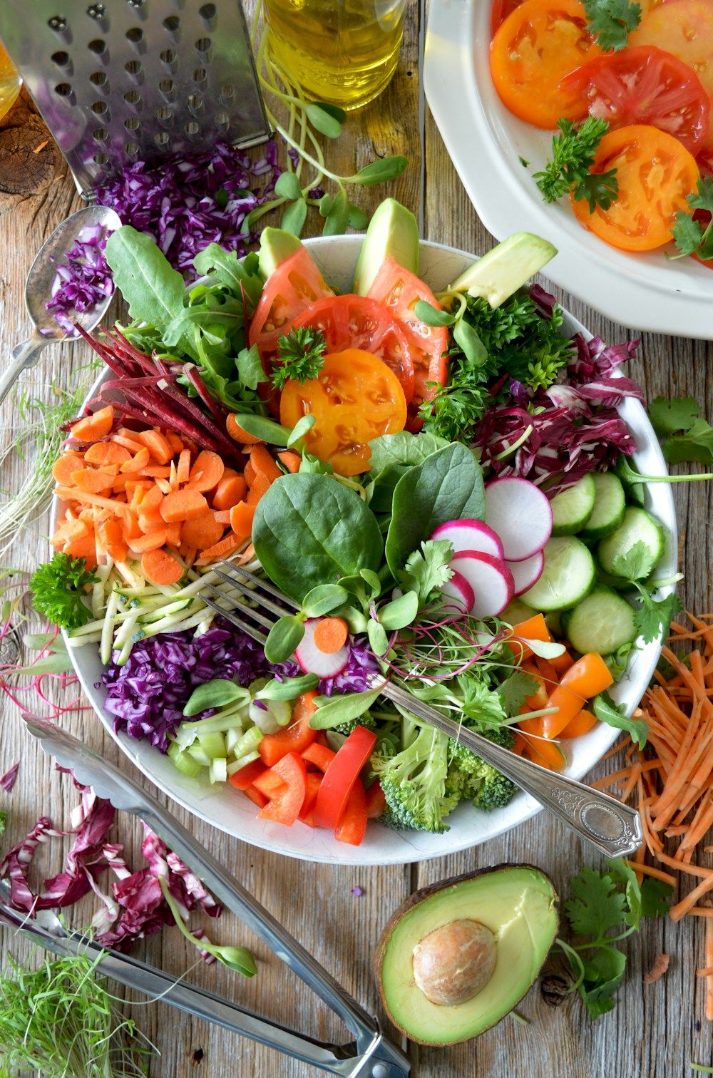 Fresh biological produce with tomatoes, greens, and local fish